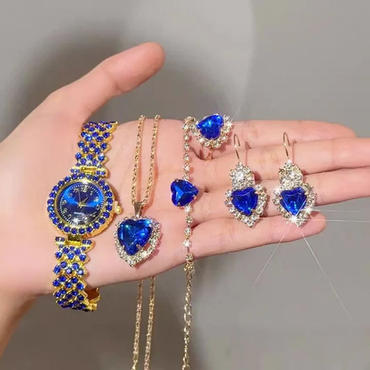 ensemble de montre et de bijoux parsemés de pierres bleues